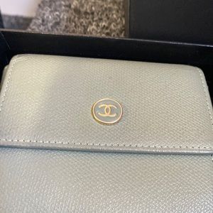 Green Chanel wallet. Approximately 15 years old. Minimum wear HAs a Hologram